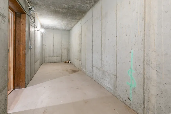 Unfinished concrete walls and ceiling