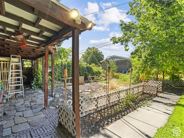 Large garden area with covered storage