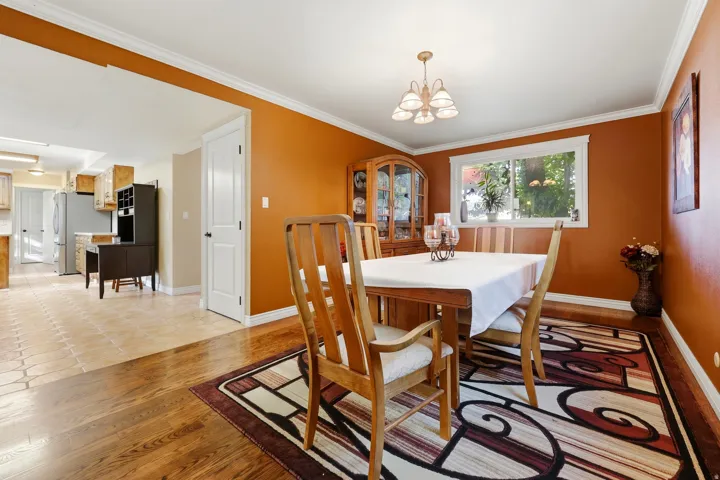Wood-finish flooring with an adjacent tiled area