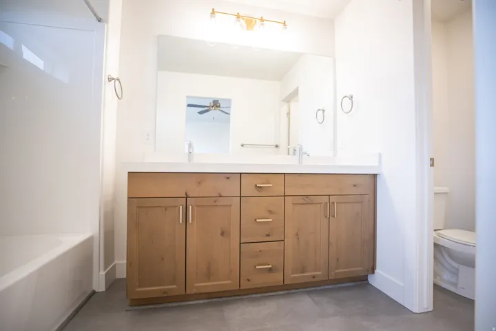 Primary bathroom featuring dual vanity