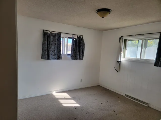 Textured ceiling with a flush mount light fixture