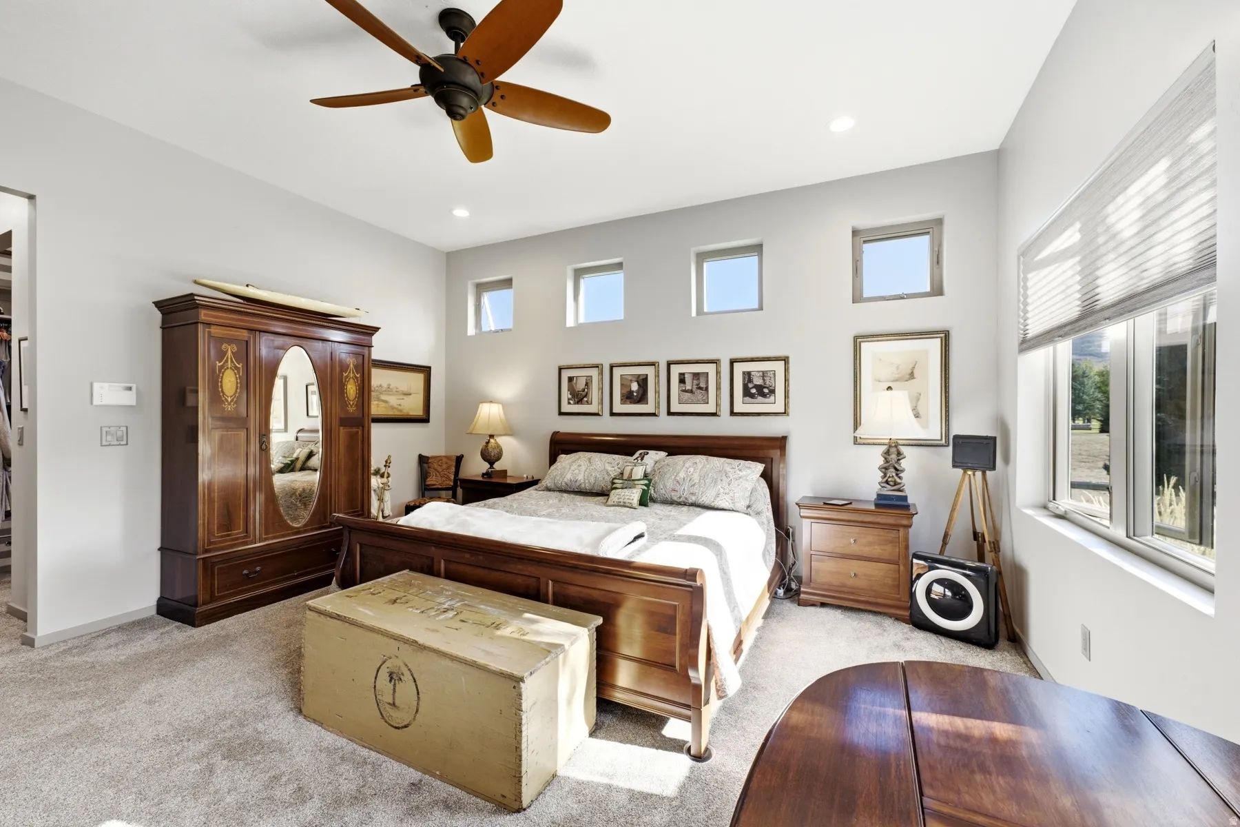 Recessed lighting, ceiling fan, and carpeted flooring