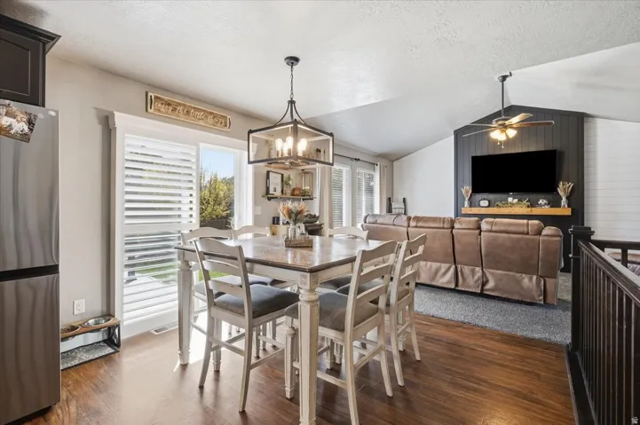Wood-finish flooring throughout the dining area