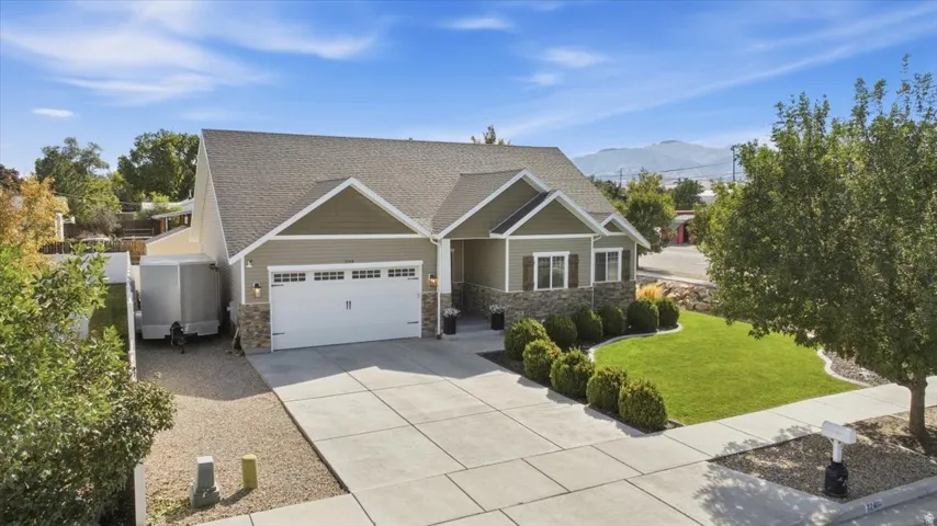 Crafted exterior with stone accents and siding