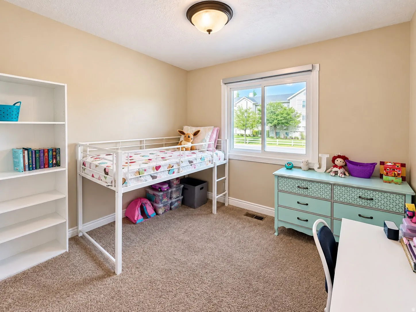Neutral-toned walls complement plush carpeting