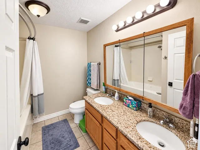 Dual vanity with stone-finish countertop