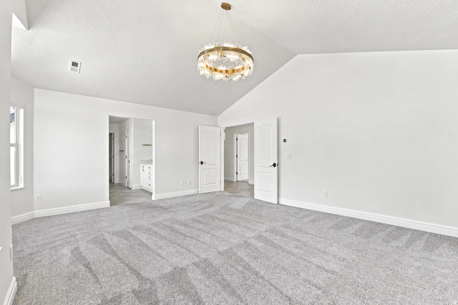 Vaulted ceiling with an elegant chandelier