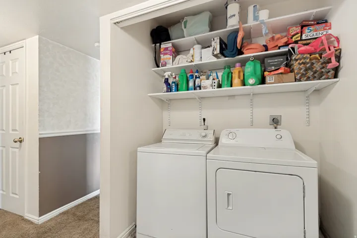 Laundry closet. Washer and dryer included.