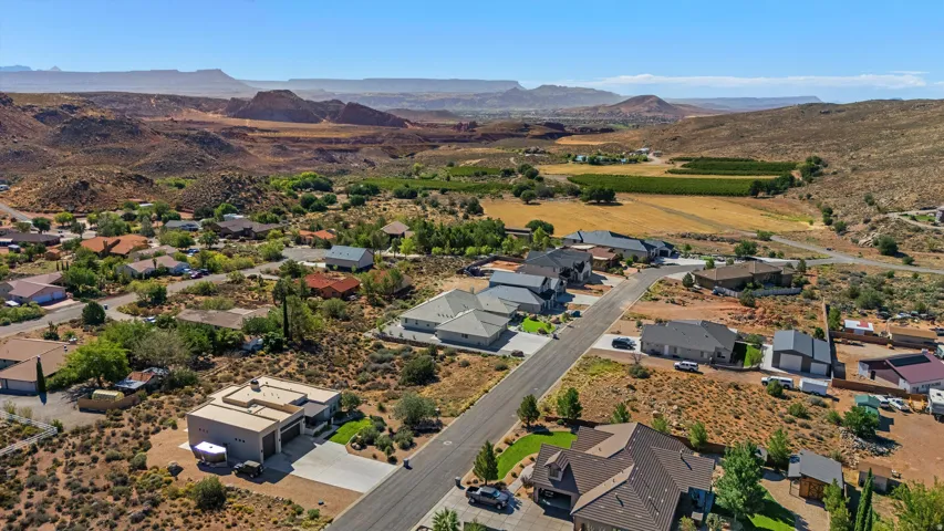 Residential development featuring diverse architectural styles and paved roadways