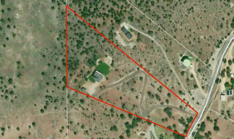 Aerial Property Boundary Map. Illustrating the defined perimeter of the property and its surrounding features