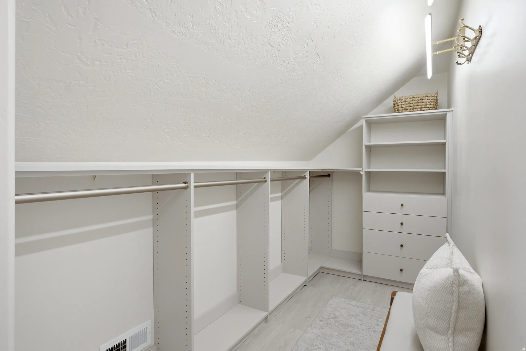 Custom built-in closet system with shelving and hanging rods