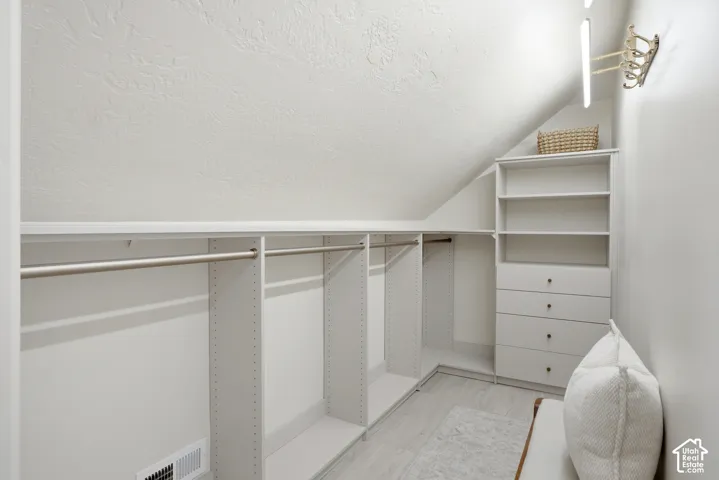 Custom built-in closet system with shelving and hanging rods