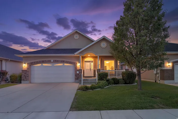Twilight view of the front of the home