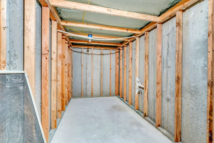 Cold storage room located under the front porch