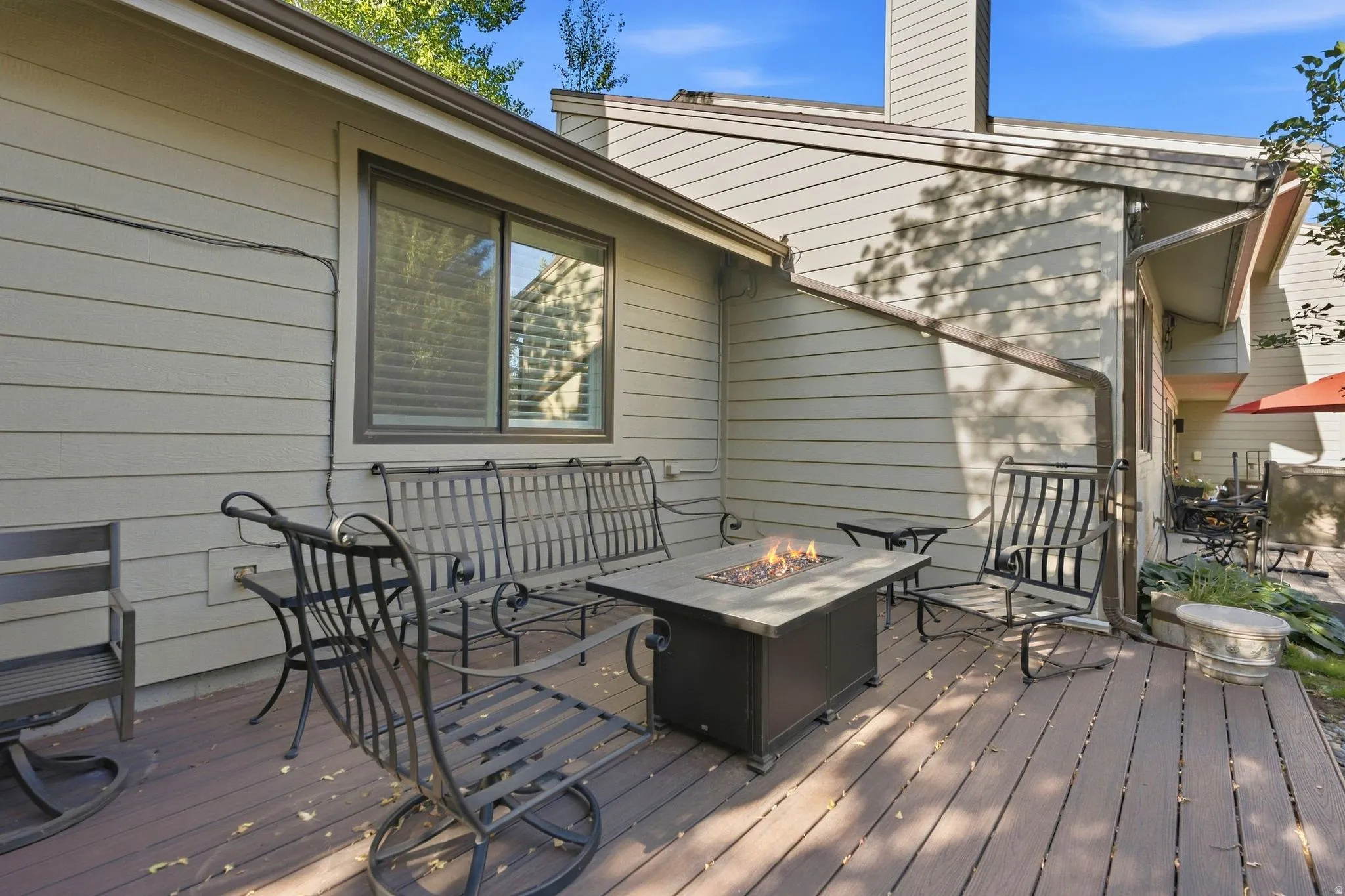 Private composite deck with built-in fire pit