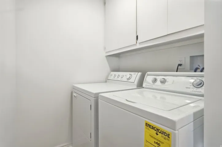 White cabinetry with integrated shelf space