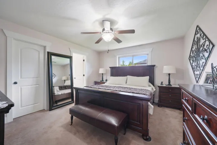 Carpeted flooring complemented by light-colored walls and white trim