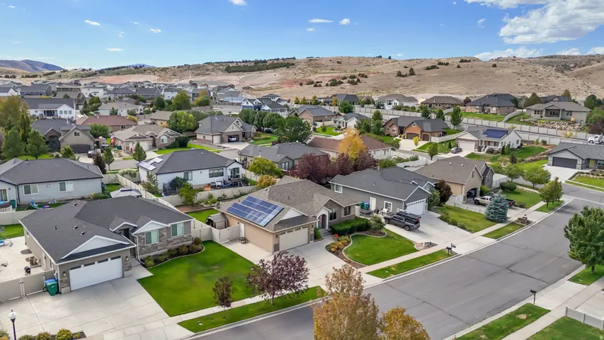 Residential neighborhood featuring varied architectural styles and mature landscaping