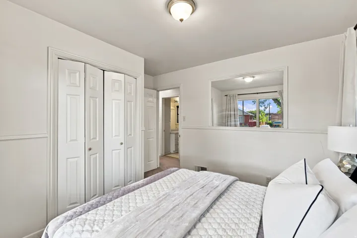 White paneled bi-fold closet doors