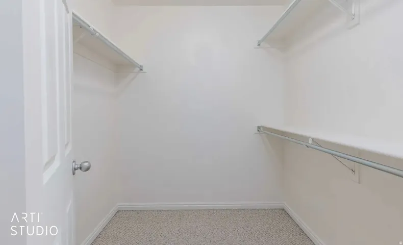 Built-in shelving and hanging rods for organized storage