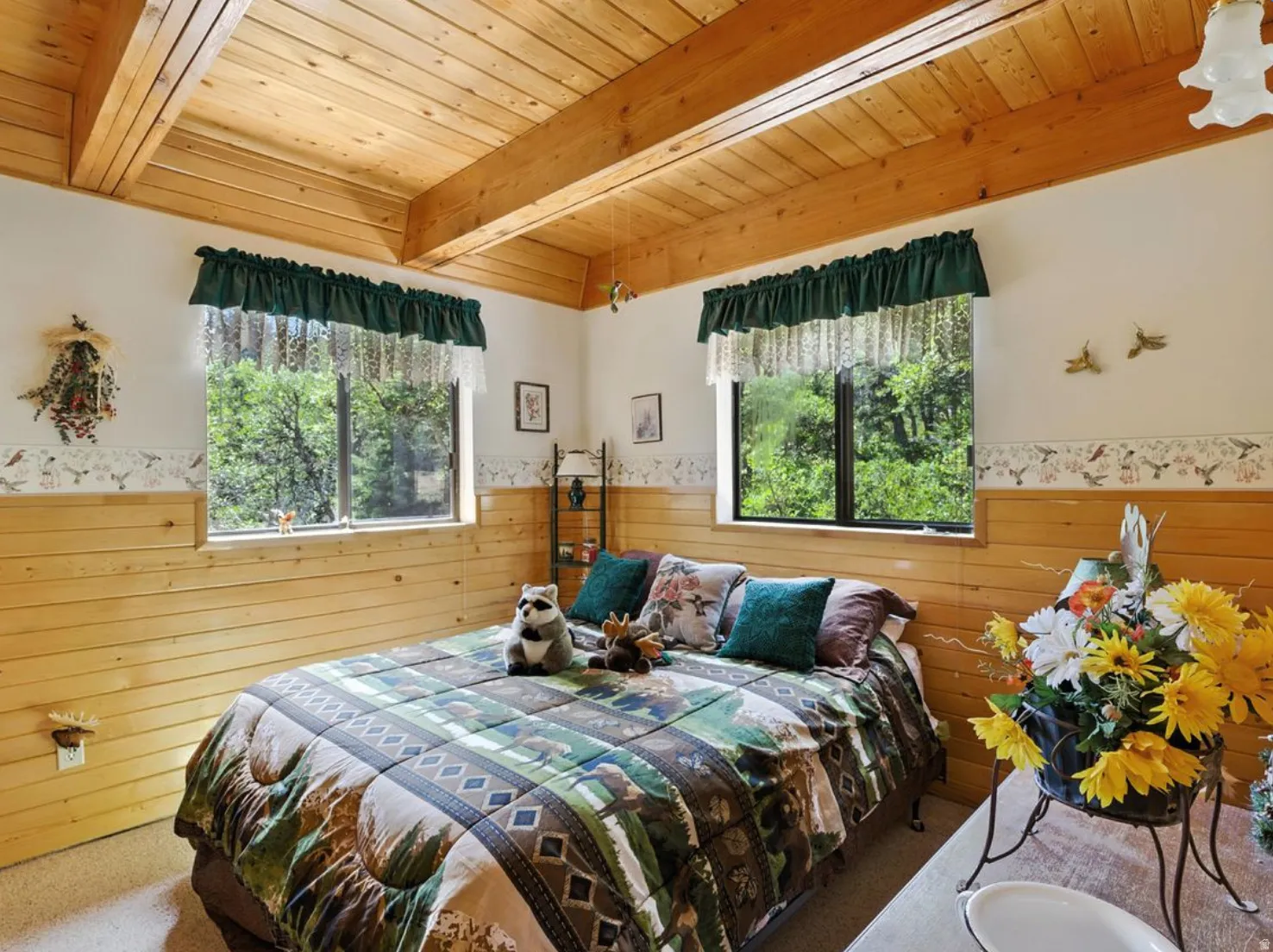 Wood-paneled walls and exposed ceiling beams