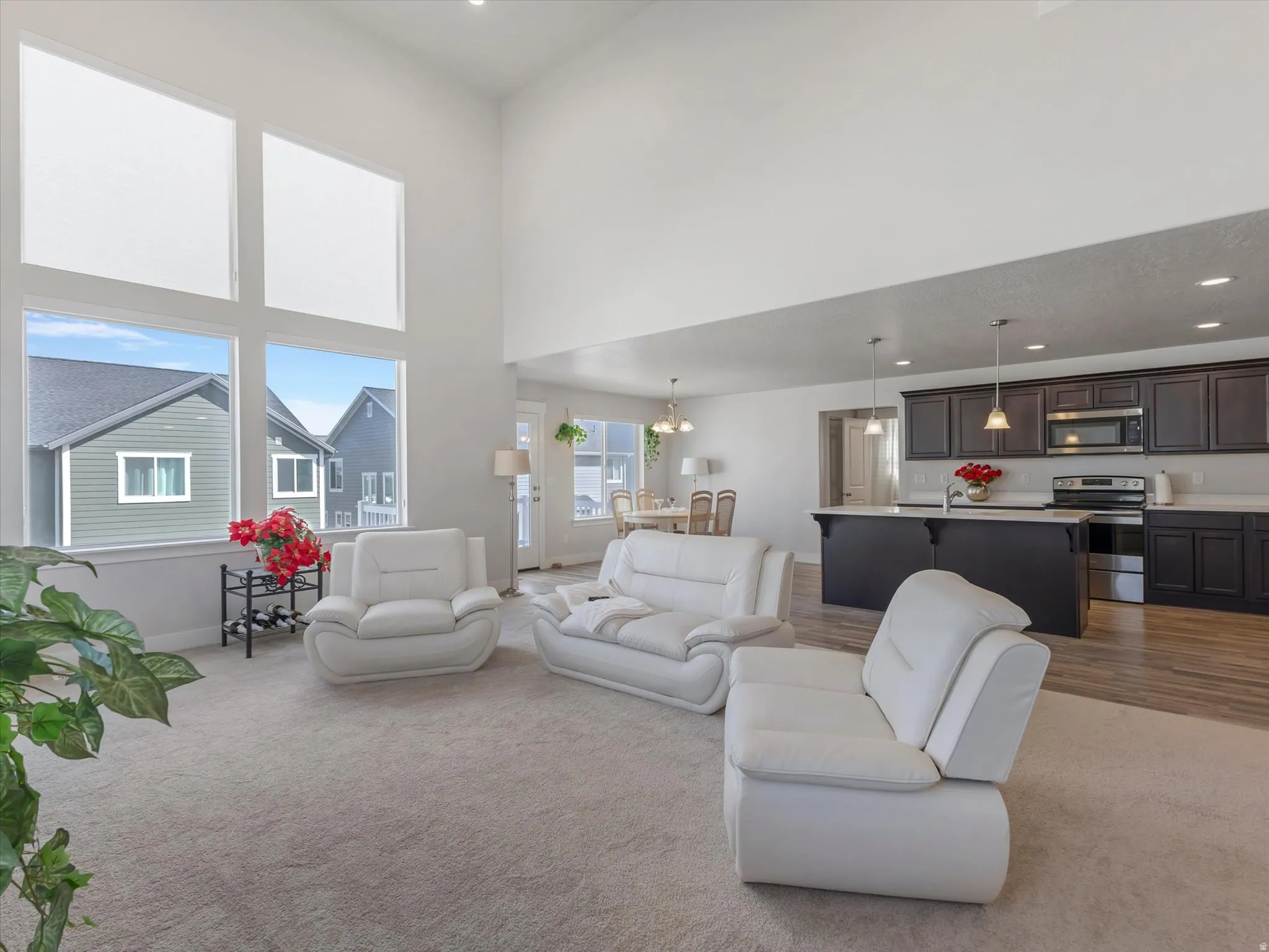 Vaulted ceilings and expansive windows create an open living area