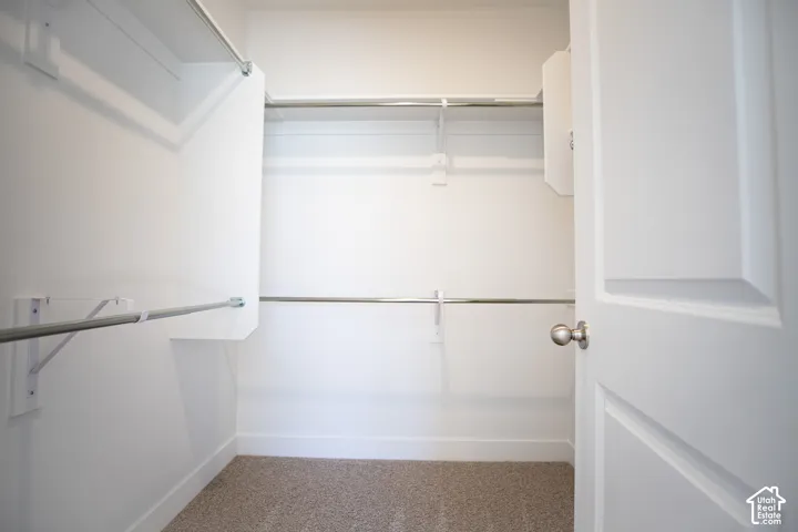 Large walk-in closet as part of primary suite.