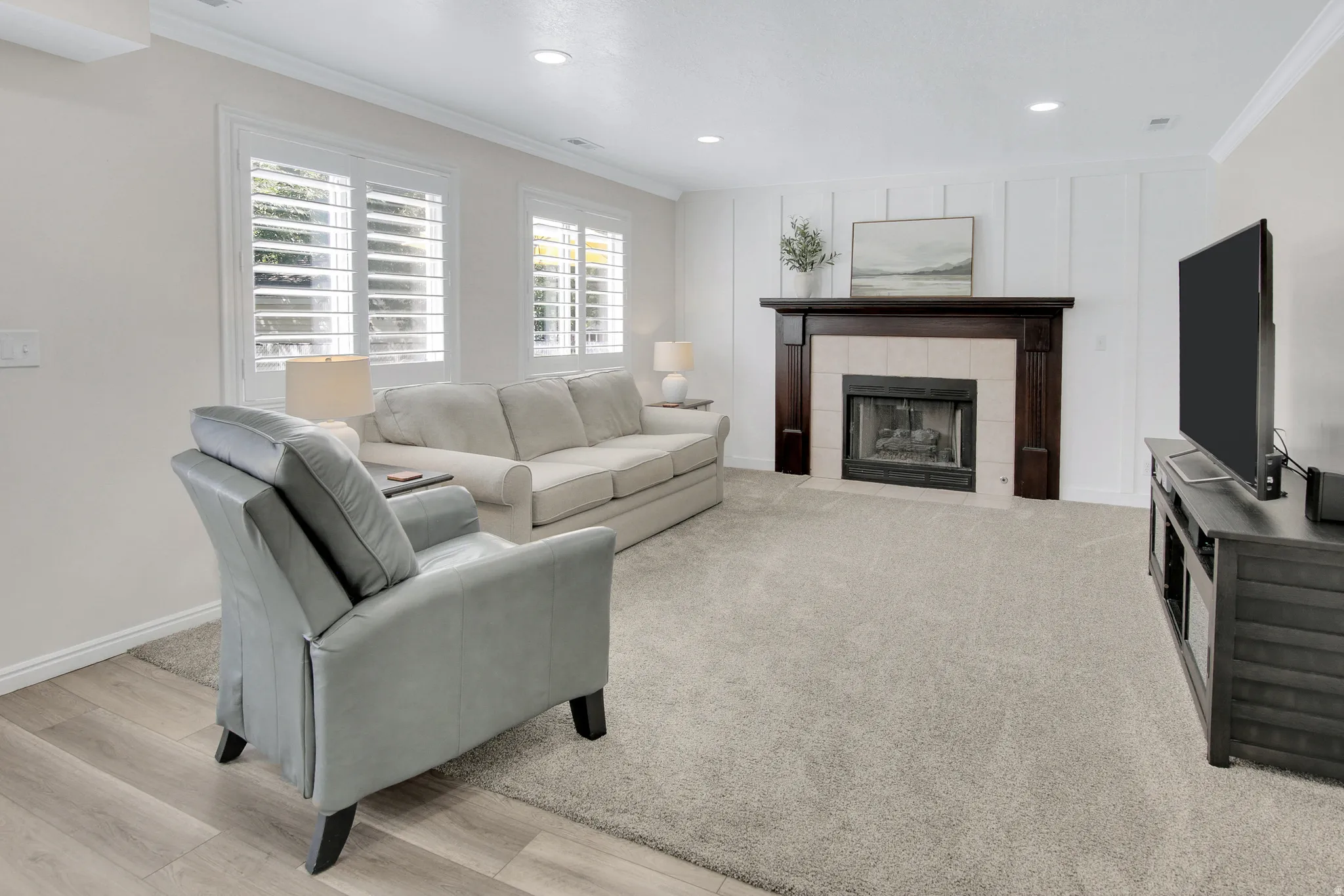 Recessed lighting, crown molding, and plantation shutters