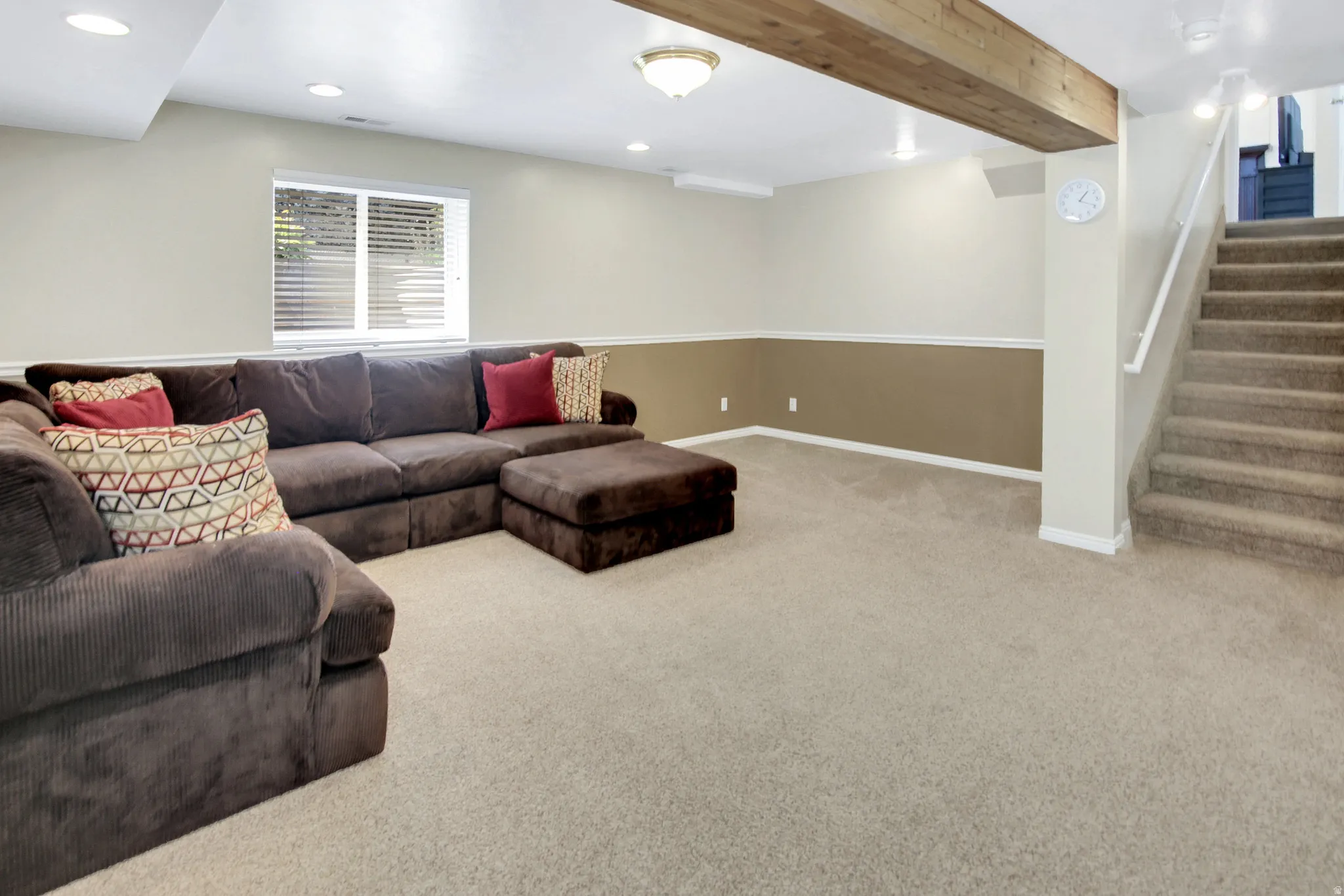 This room offer versatility for use. Recessed lighting, wood-finish ceiling beam, dual-tone wall treatment, and storage area. Plumbing for future bath