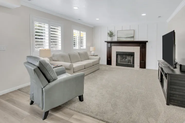 Recessed lighting, crown molding, and plantation shutters