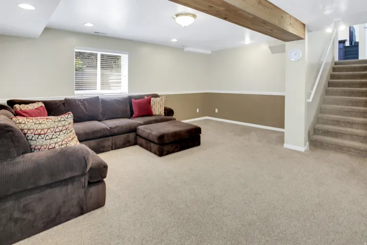 This room offer versatility for use. Recessed lighting, wood-finish ceiling beam, dual-tone wall treatment, and storage area. Plumbing for future bath