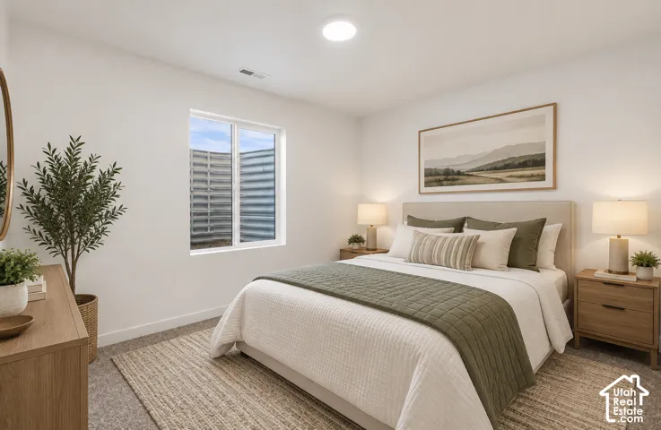 Recessed lighting, window with ample natural light, and carpeted flooring
