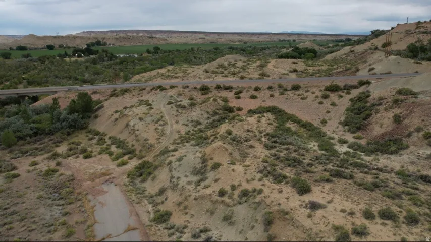 Rural landscape with varied terrain and established vegetation