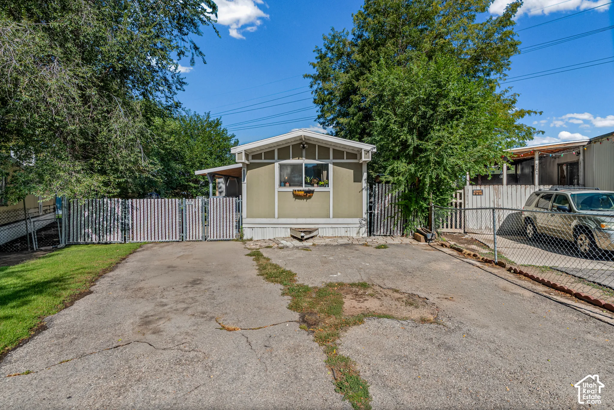 Large single wide mobile home that's over 1,100 sq ft. Located in a cul-de-sac with lots of parking and a fully fenced yard.