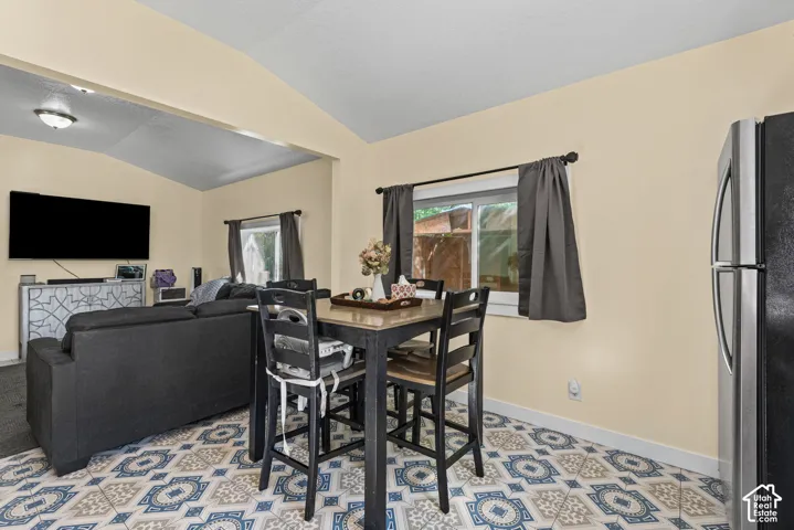 Dining room with tiled flooring