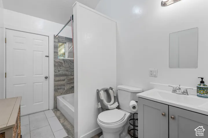 Updated bathroom with tile shower and tile flooring