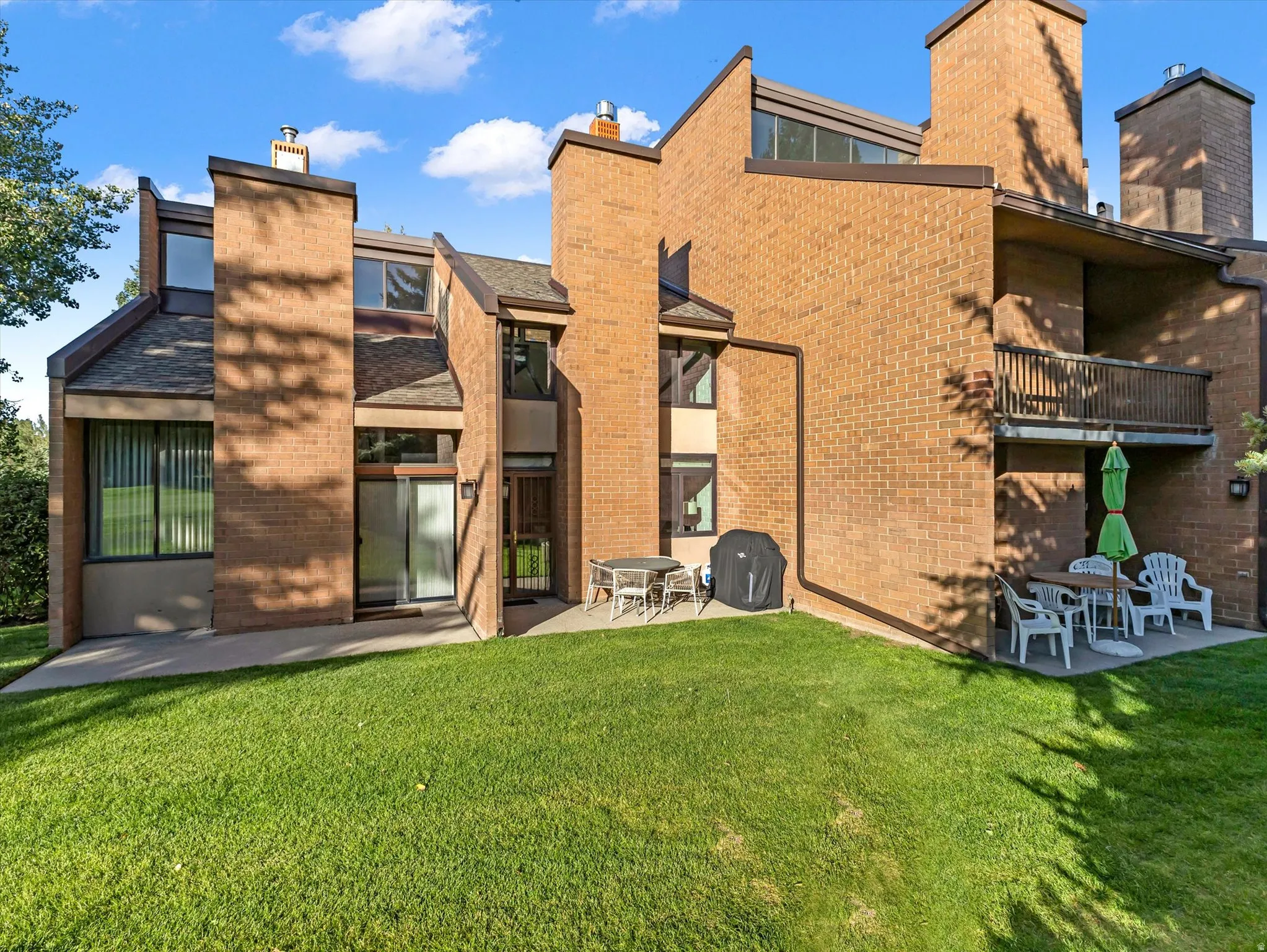 Brick exterior with multiple chimneys