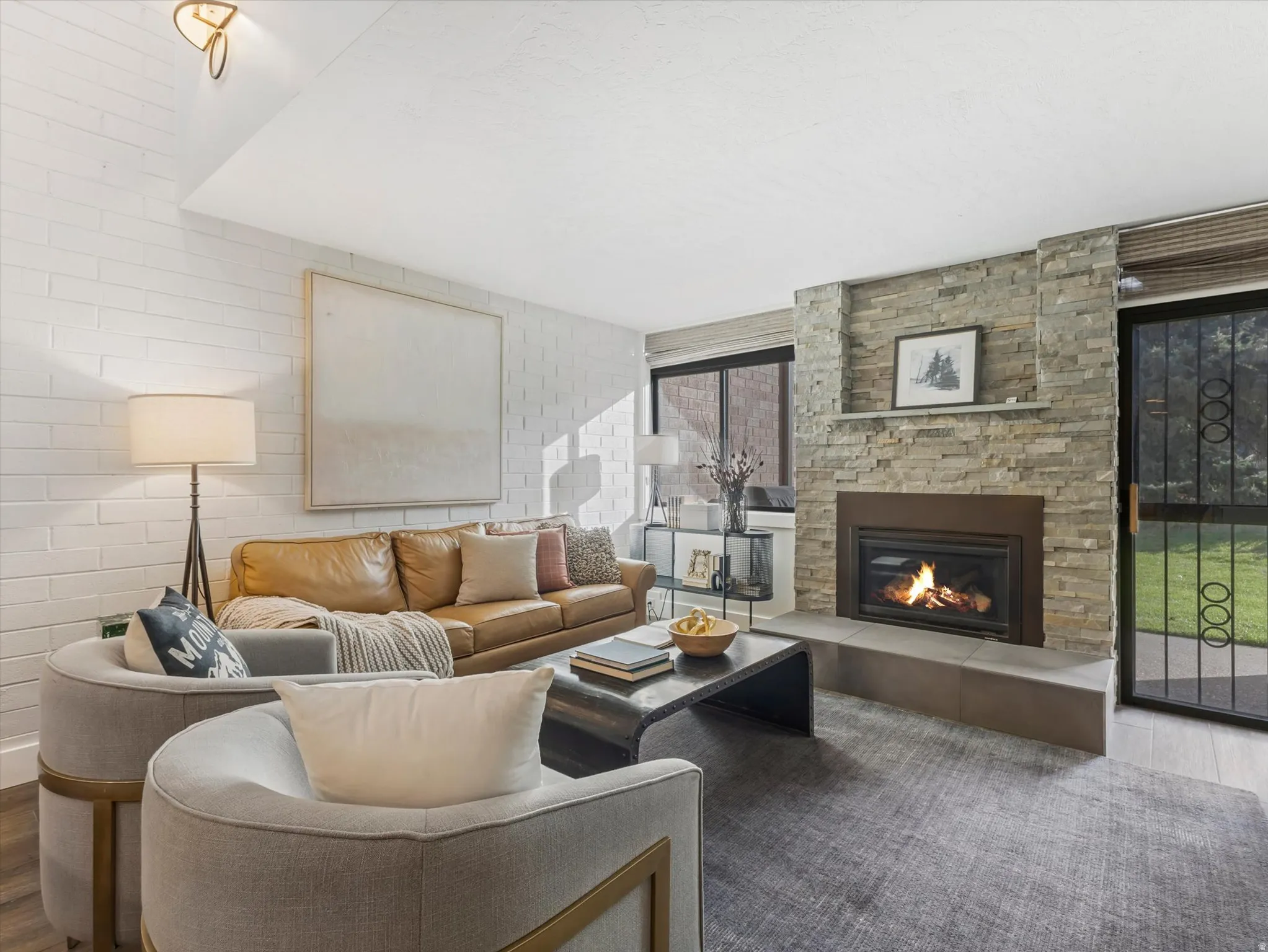 Living room walks right out onto golf course and cross country ski trails.