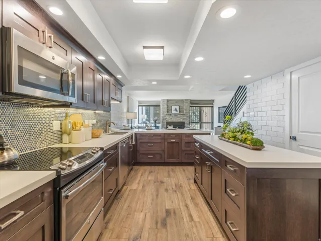 Fully remodeled custom oak kitchen with solid surface counter tops