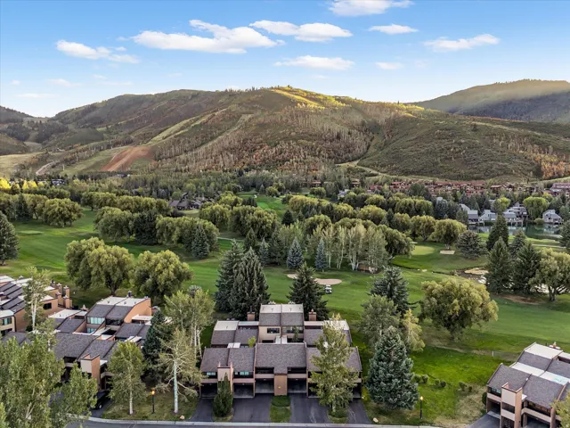 Overhead view of townhome with golf course and mountain views