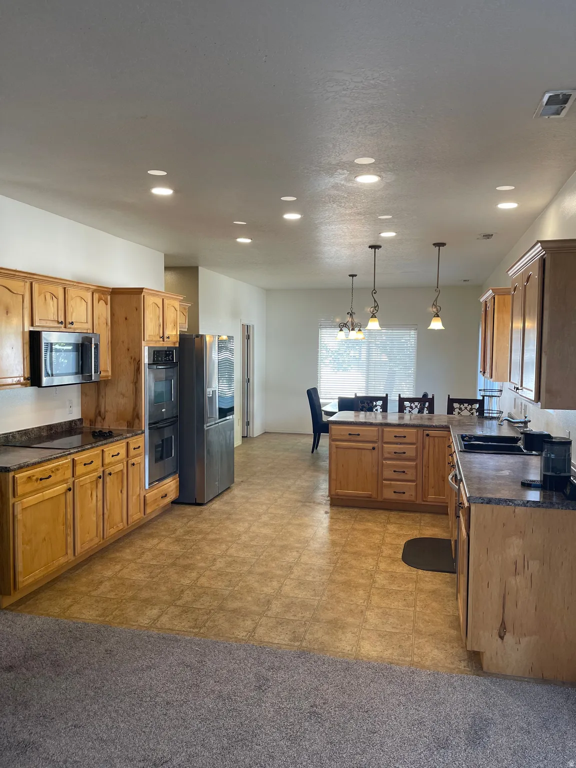 Open Kitchen / Large Semi-formal Dining Room / Pantry
