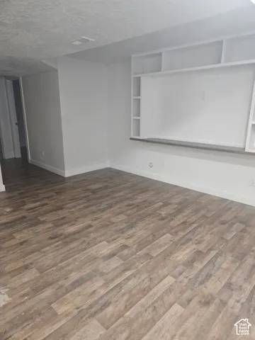 Wood-finish flooring throughout