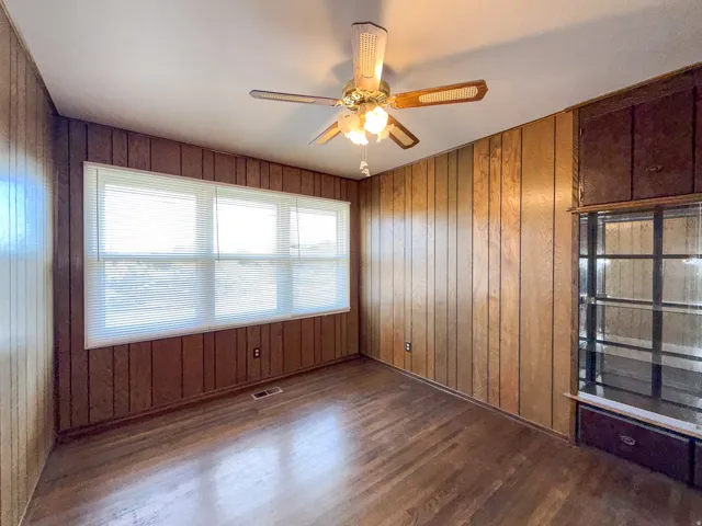 Wood-finish wall paneling and flooring