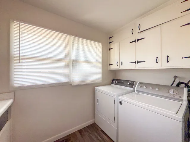 Upper cabinetry with decorative hardware