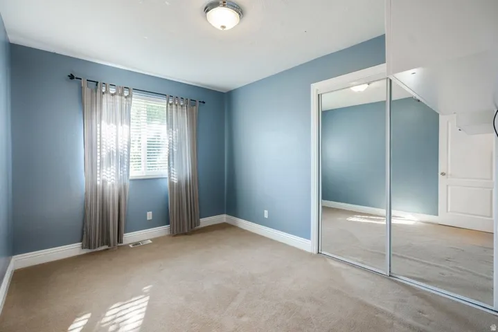 Bedroom or office next to the primary bedroom.  This room could be easily renovated into a big closet and connected to the primary bedroom.