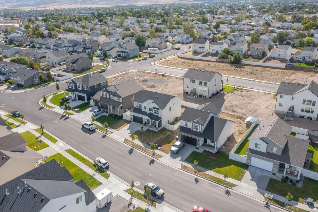 Residential neighborhood featuring paved streets, developed landscaping, and newly constructed homes