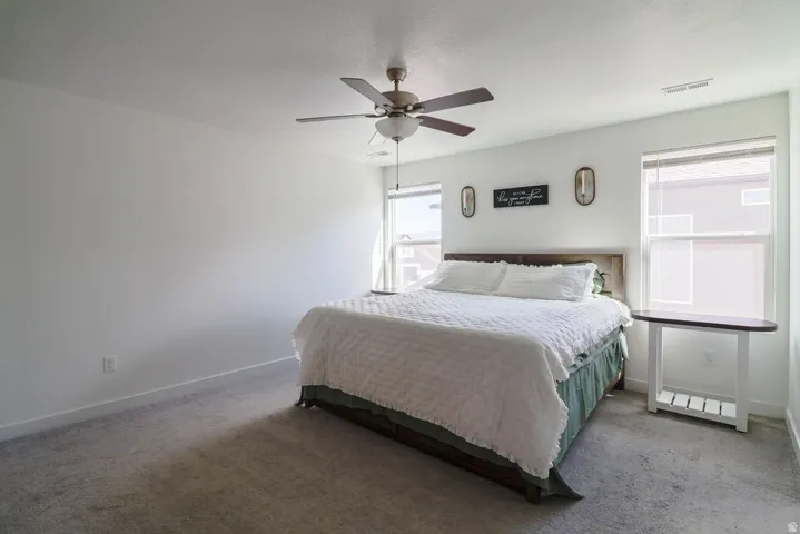 Neutral wall tones with soft carpeting