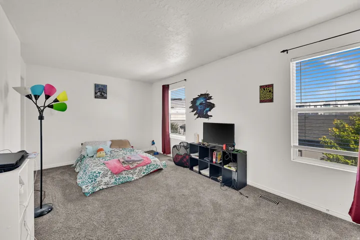 Neutral-toned carpeting throughout