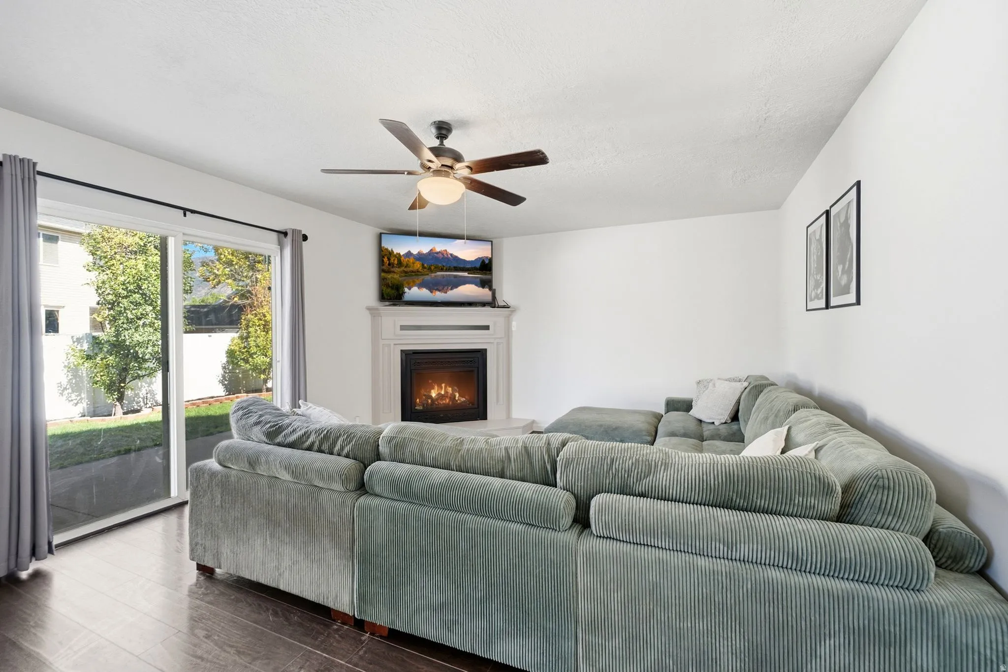 Cozy up by the gas fireplace or step right outside to enjoy the backyard and outdoor living spaces.