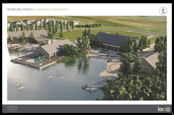 Lakeside property featuring multiple community buildings, a large swimming pool, a sandy beach area, and a private dock